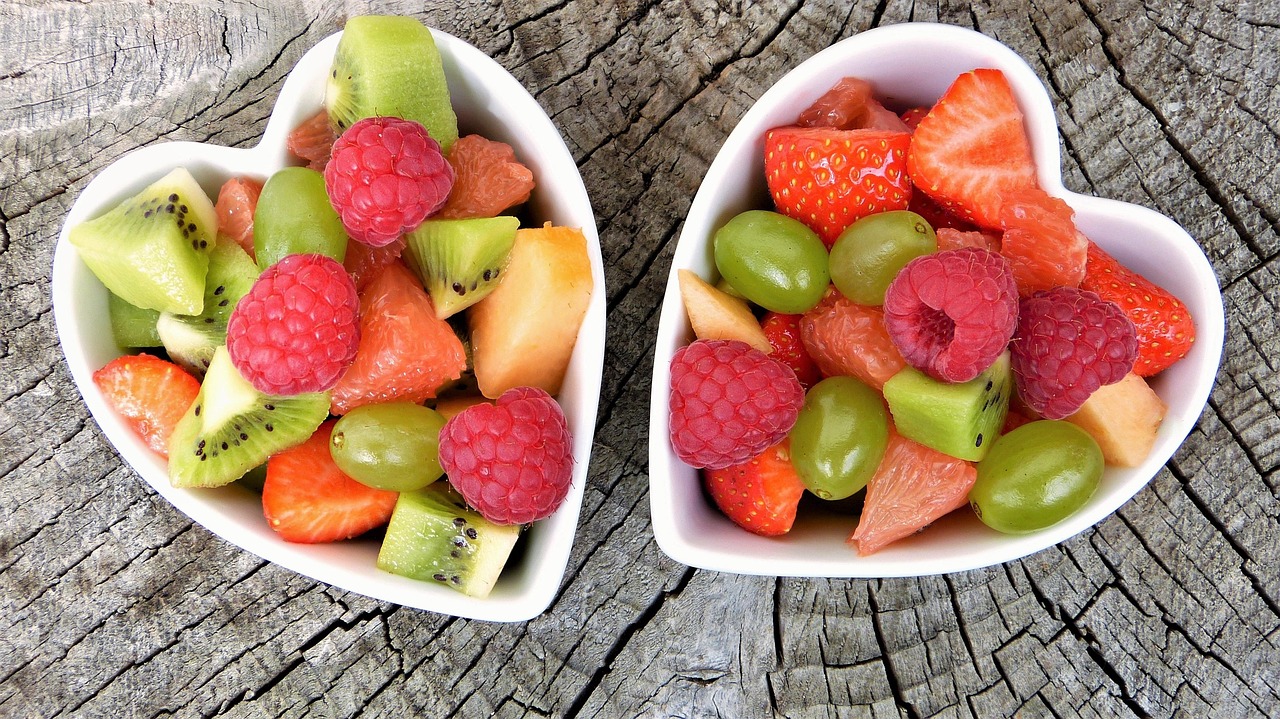 Assortment of fresh berries and fruits including blueberries and strawberries